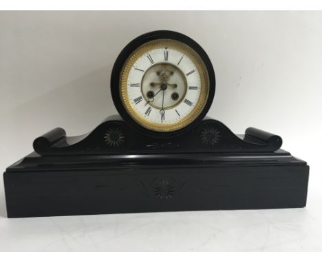 A large slate mantel clock with no key or pendulum.