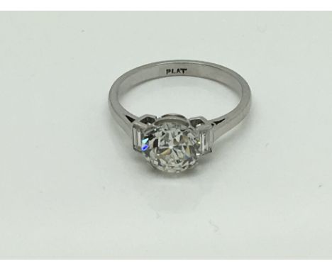 A Fine Quality (2.03ct) two carat diamond and paltnium ring, set with a central flawless round brilliant old cut diamond, VVS