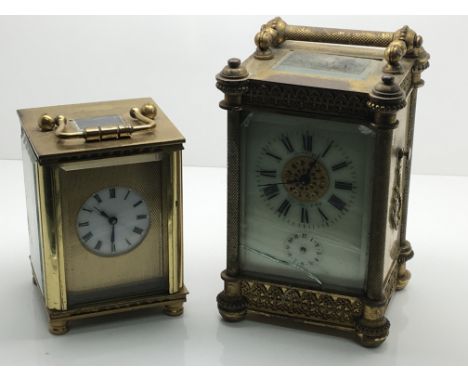 A small brass cased carriage clock and one other alarm carriage clock. both for spares or repairs.