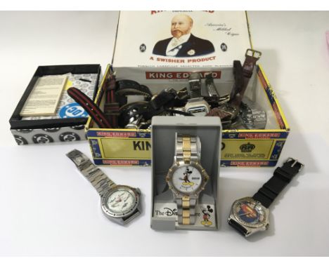 A collection of old and vintage watches a Russian watch the dial with images of aircraft a Micky Mouse watch and Super Man wa