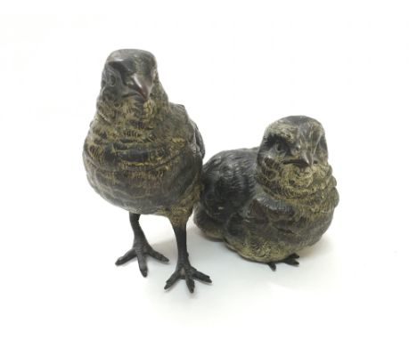 A late 19th century or early 20th century Australian gold painted bronze inkwell in the form of two birds, indistinctly stamp