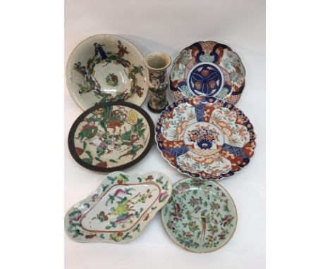 A collection of Oriental ceramic plates and a vase (7).