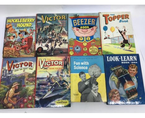 A collection of children's annuals mainly from the 1960's including Valiant, The Eagle, Victor, Topper, Beezer, Wagon Train, 