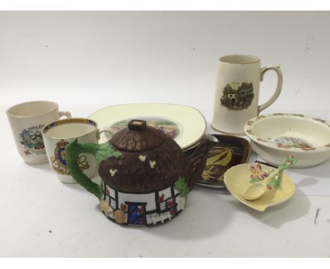 A collection of ceramics including a Minton 1937 coronation mug, Doulton a modern design Poole dish and other ceramics.
