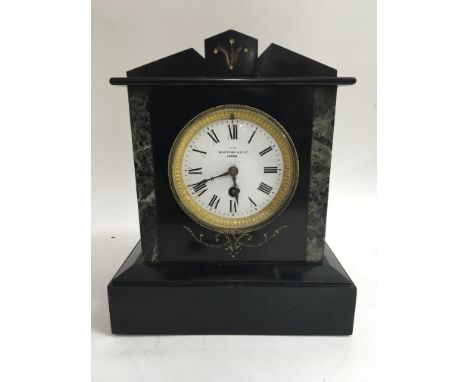 A Benetfink & Co. Ltd London slate mantel clock with key and pendulum.
