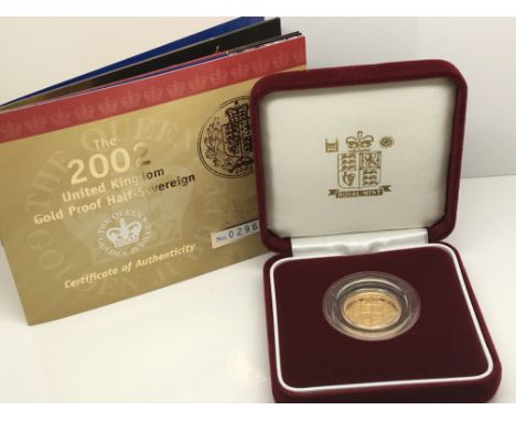 A 2002 gold Sheild back Half-Sovereign with Royal Coat of Arms, with certificate of authenticity, From the Royal Mint.
