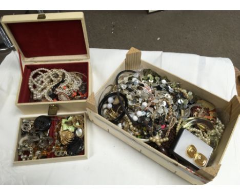 Two boxes of vintage costume jewellery