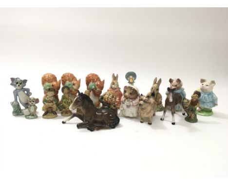 A collection of ceramic miniature figures including Wade Tom and Jerry figures, Beswick Beatrix Potter figures, a Beswick hor