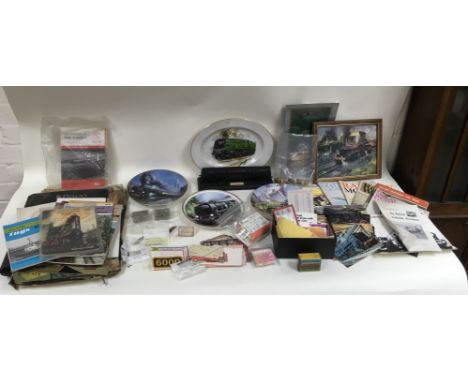 An interesting collection of railway memorabilia including ticket stubs, GWR buttons, model steam engine, plates and ephemera