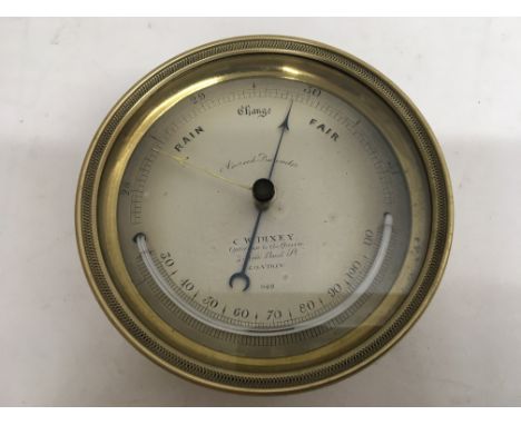 A quality Aneroid brass barometer by C.W. Dixey. New Bond Street, London.