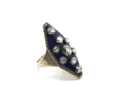 An interesting unmarked yellow metal, likely Victorian, gothic style ring set with nine white sapphires on blue enamel, ring 