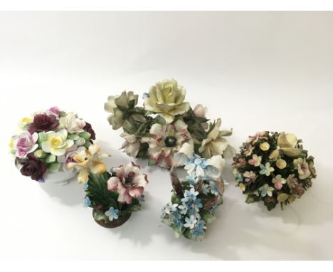 A collection of ceramic posies ornaments including Capodimonte