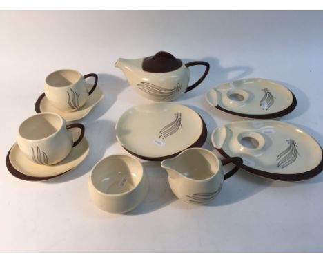 A Carltonware brown and cream modern design part service including a tea pot.
