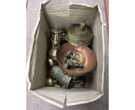 A small box of mixed brassware including a vintage match holder