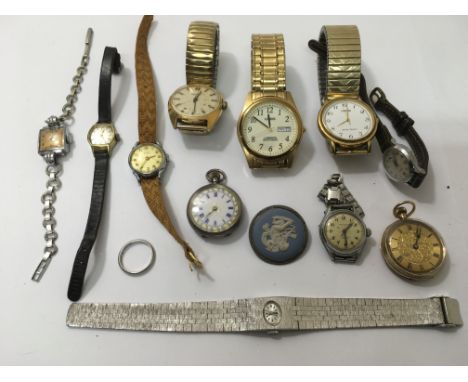 A collection of wristwatches, a jasperware brooch and a white metal ring.