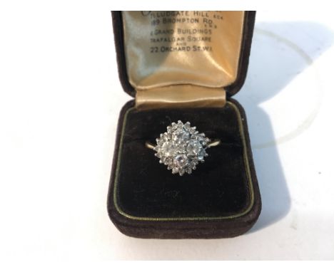 A diamond cluster ring with four central stones (one small stone missing). Weight approx 5.2g Size approx S