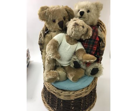 3 vintage bears and a child's wicker chair