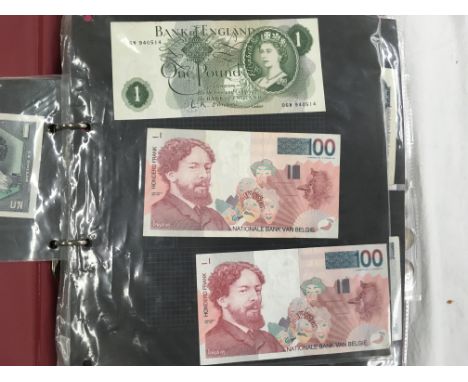 An album of coins and bank notes including first day covers