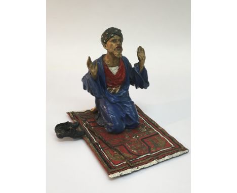 An Austrian bronze of an Egyptian market trader, approx 13cm high.