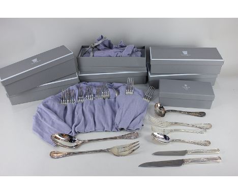 A Puiforcat, Paris, silver plated canteen comprising ten large and small forks, ten large and small knives, ten dessert spoon