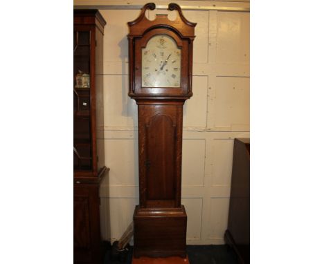 A George III oak longcase clock, the painted domed 12 inch dial with secondary dial and date aperture, the eight-day movement