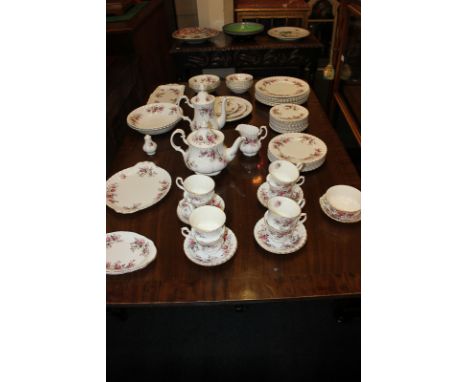 A Royal Albert porcelain Lavender Rose pattern part dinner and tea set, including teapot, hot water pot, milk jug, seven dinn