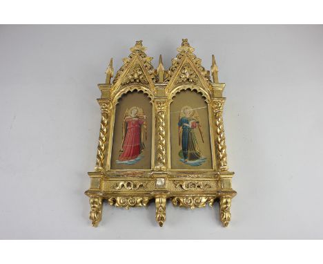A Renaissance style moulded gilt frame, with two pointed arches above a pair of colour prints depicting angels playing musica