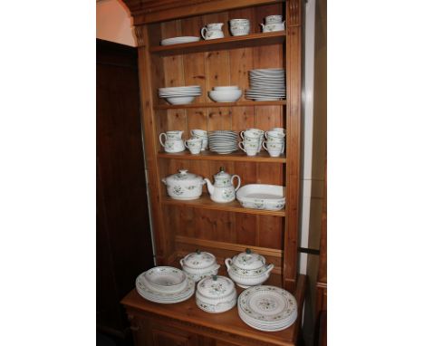A Royal Doulton porcelain part dinner and tea service in the Provencal pattern, including four tureens and covers, five oval 