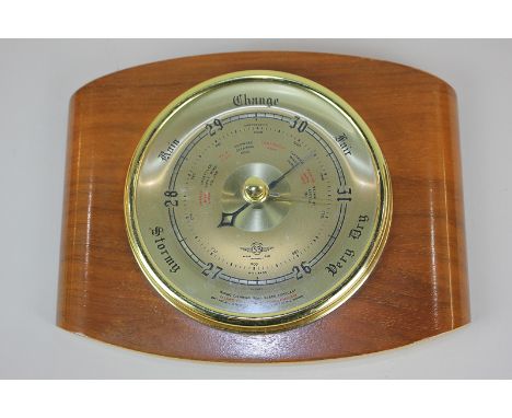 A mid 20th century Shortland SB aneroid wall barometer on wood surround, 20.5cm wide