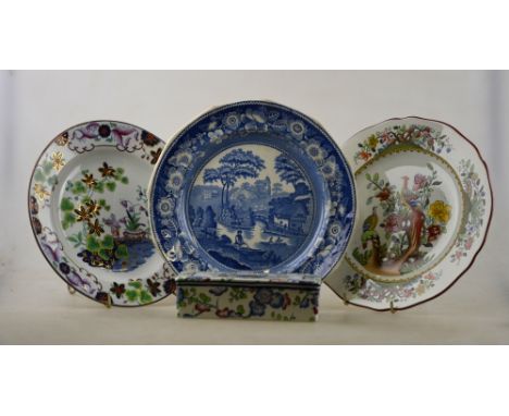 A Fell & Co blue and white plate decorated with a lake scene, figures, bridge and buildings within a dog rose border, 23.4 cm