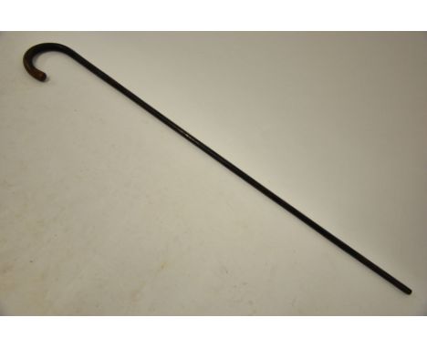 A late 19th century French rosewood sword-stick with twist release action, 70 cm Toledo steel blade and concave square sectio