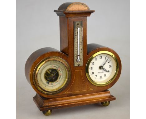 An inlaid mahogany desk-clock incorporating aneroid barometer and mercury thermometer, 19 cm