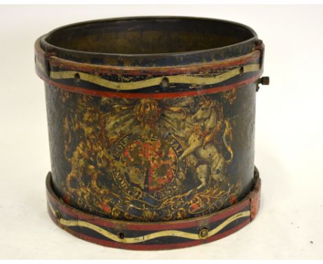 An antique military side-drum, transfer-decorated with a Royal Coat of Arms, 38 cm diameter (used as a waste-paper bin but wi