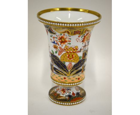 A early 19th century Spode vase raised on a short circular pedestal with beaded borders and Imari decoration, pattern 967, 16