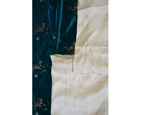 A vibrant jade green fabric bolt of Chinese silk with embroidered floral sprays and butterflies (unused condition), 1366 cm l