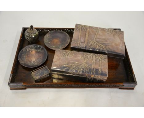 A Japanese smoking set by Arthur & Bond Yokohama, early 20th century, comprising  Sterling cigarette and cigar boxes embossed