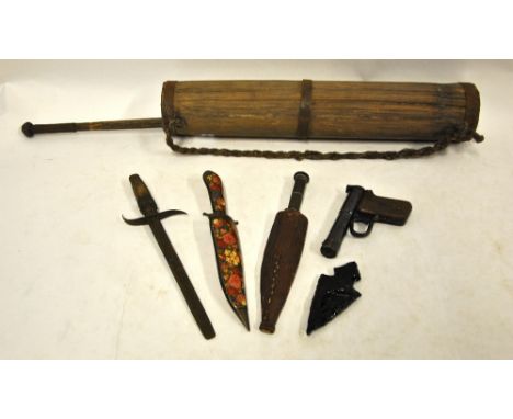 A Drum Tell II .177 air pistol, to/w an obsidian spear-head, three Eastern daggers and a bamboo quiver with arrow-lifter