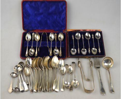 A quantity of Georgian and later teaspoons and other flatware including sauce ladle and sugar tongs - various makers and date