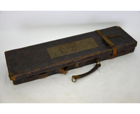 An antique leather gun case for W J Jeffery & Co Ltd, London to/w remaining tools