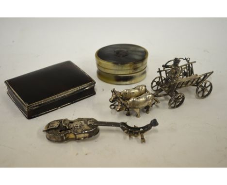 A 19th century Continental .800 grade miniature violin with chased decoration, to/w a Dutch .833 standard miniature ox-cart, 