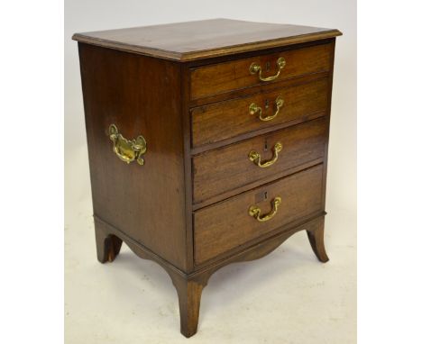 A 19th century mahogany four drawer cabinet converted from a commode, brass carrying handles to each side, raised on splayed 