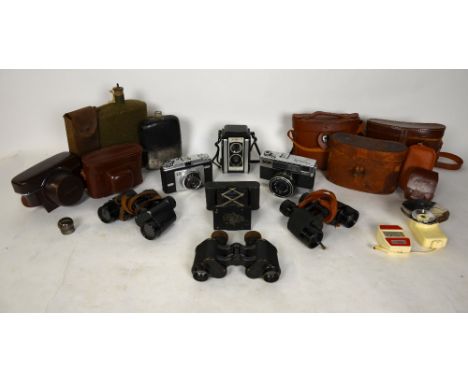 A pair of WWI Binocular Prismatic no.3 (Mk II) by W. Watson & Son Ltd., 1918, a pair of WW2 US military Binocular M5, W. O. C