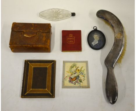 A Georgian oval portrait miniature on ivory of a gentleman in grey peruke and blue coat, to/w a 19th century musical box with