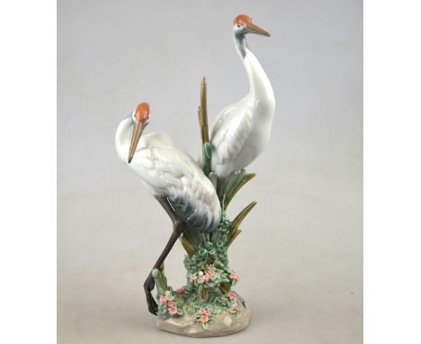 A Lladro figural group of herons, 28 cm high Condition Report Good condition