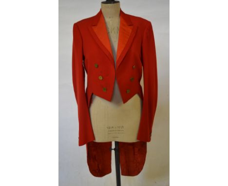 A hunting 'Pink' wool tail coat fastened with six initialled brass buttons