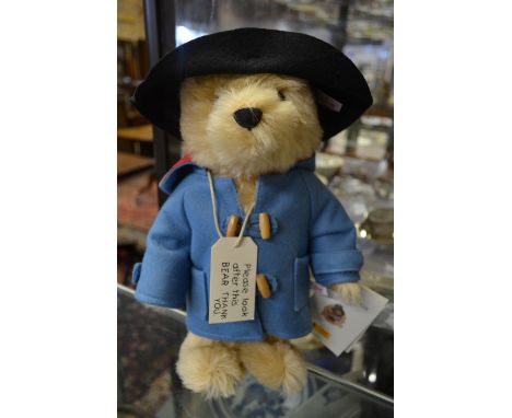 A boxed Steiff Paddington Bear with suitcase, 30 cm