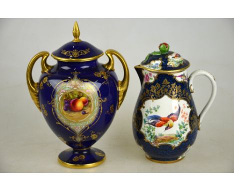 A late Victorian Royal Worcester twin handle urn and cover finely hand painted to the centre with a circular panel of fruit, 