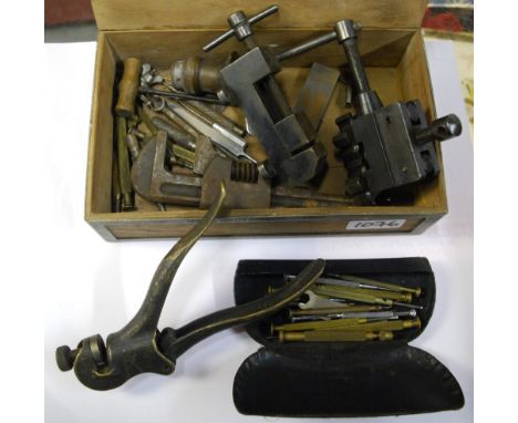 A quantity of watchmaker's tools, watches, corkscrews, etc.