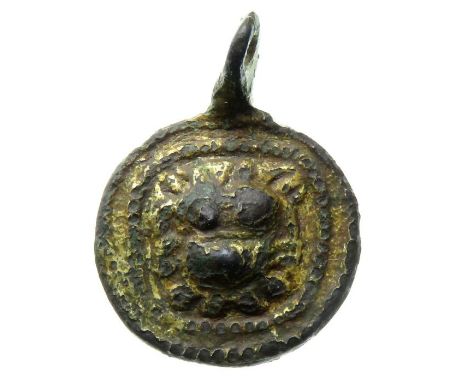 Medieval Harness Pendant. Circa, 13th century AD. Copper-alloy, 25.39 mm. A circular gilt bronze horse harness pendant detail