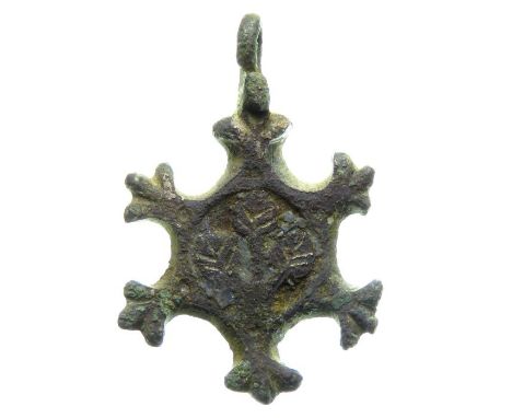Medieval Harness Pendant. Circa 15th century AD. Copper-alloy, 36.42 mm. A horse harness hanging pendant formed of a sexfoil 